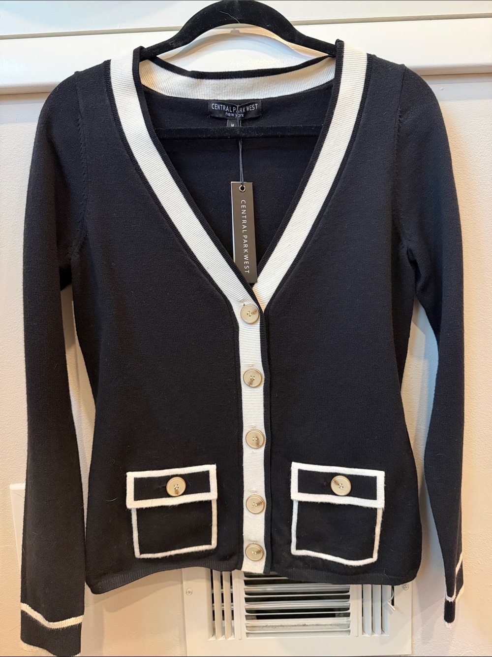Central Park West Black Cardigan with Cream Trim V-Neck